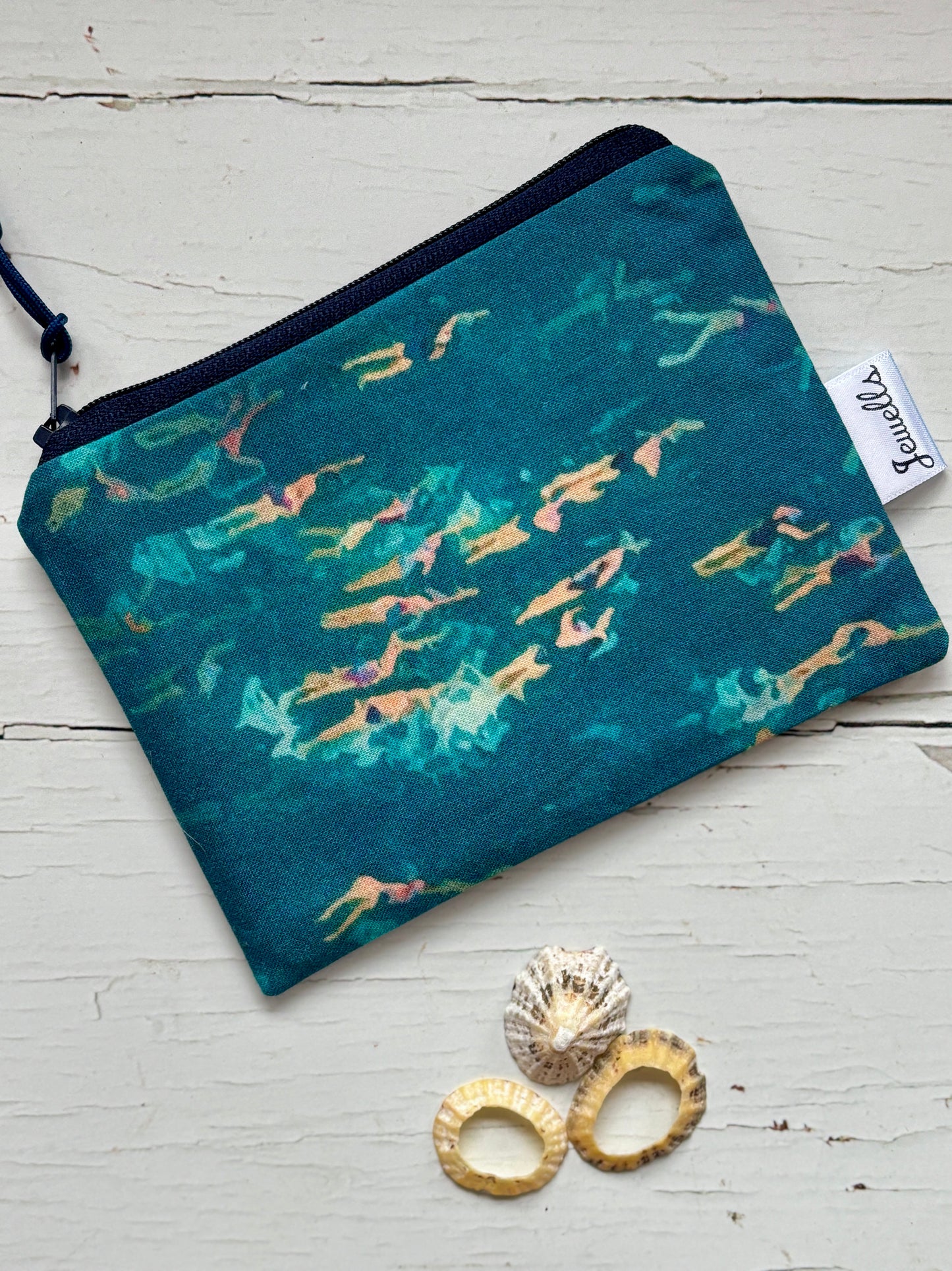 zipped fabric purse with abstract swimmers print, vibrant coastal design for beach lovers and wild swim fans