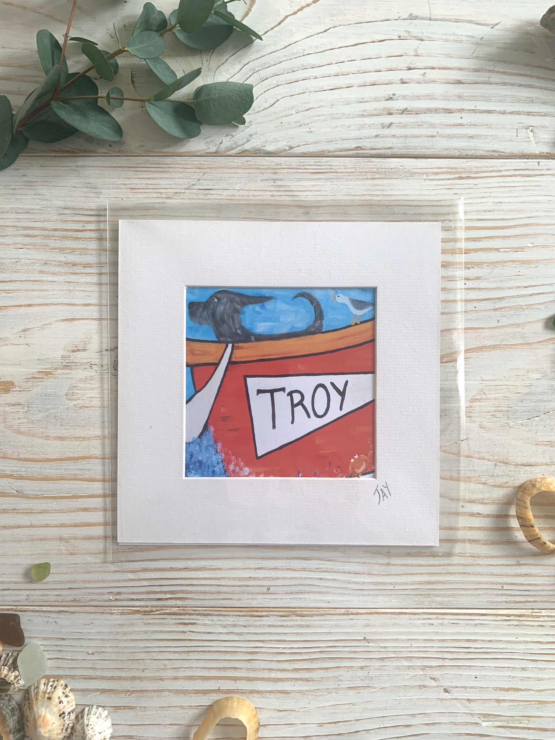 Mini mounted print of a dog in a boat called Troy