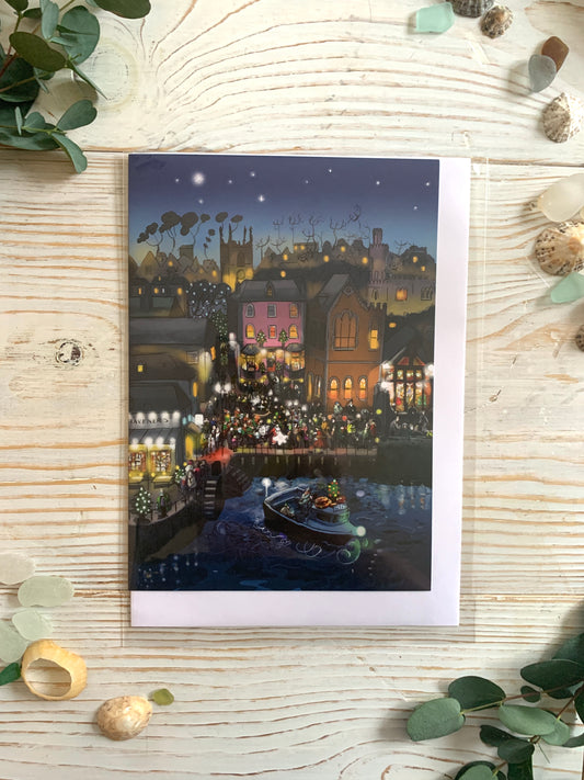 Christmas card depicting a festive scene on Fowey's Town Quay
