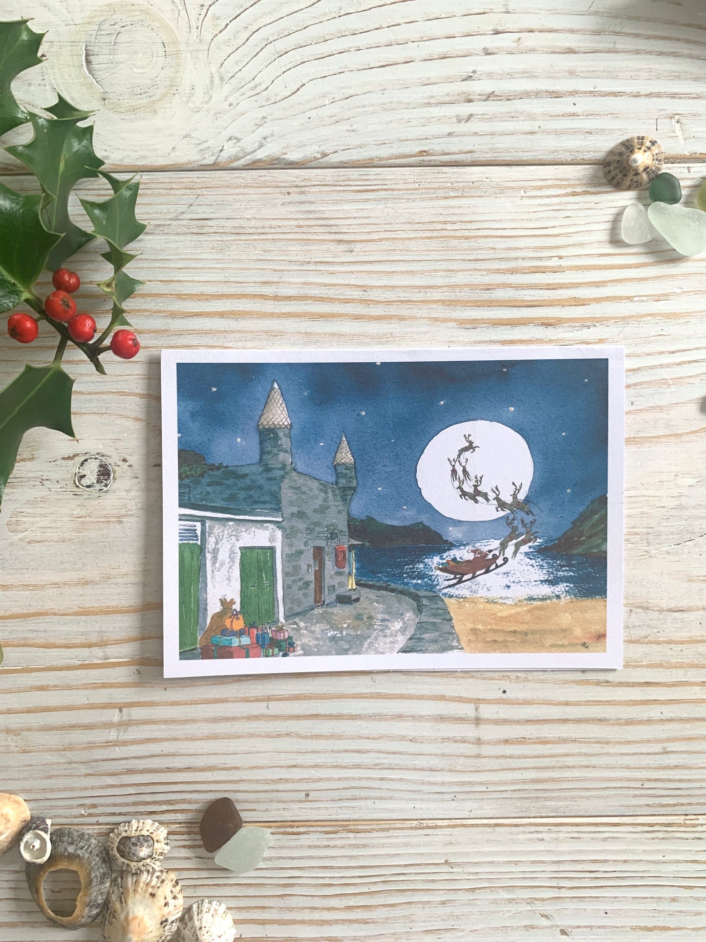 A Christmas card depicting Santa and his sleigh flying away from Readymoney
